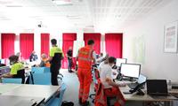 Operatori sanitari di Trentino emergenza al lavoro al pc nella sala operativa della protezione civile allestita per il concerto di Vasco Rossi 